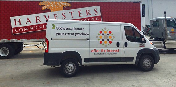Harvester's Van picking up after the Harvest Gleaning Produce