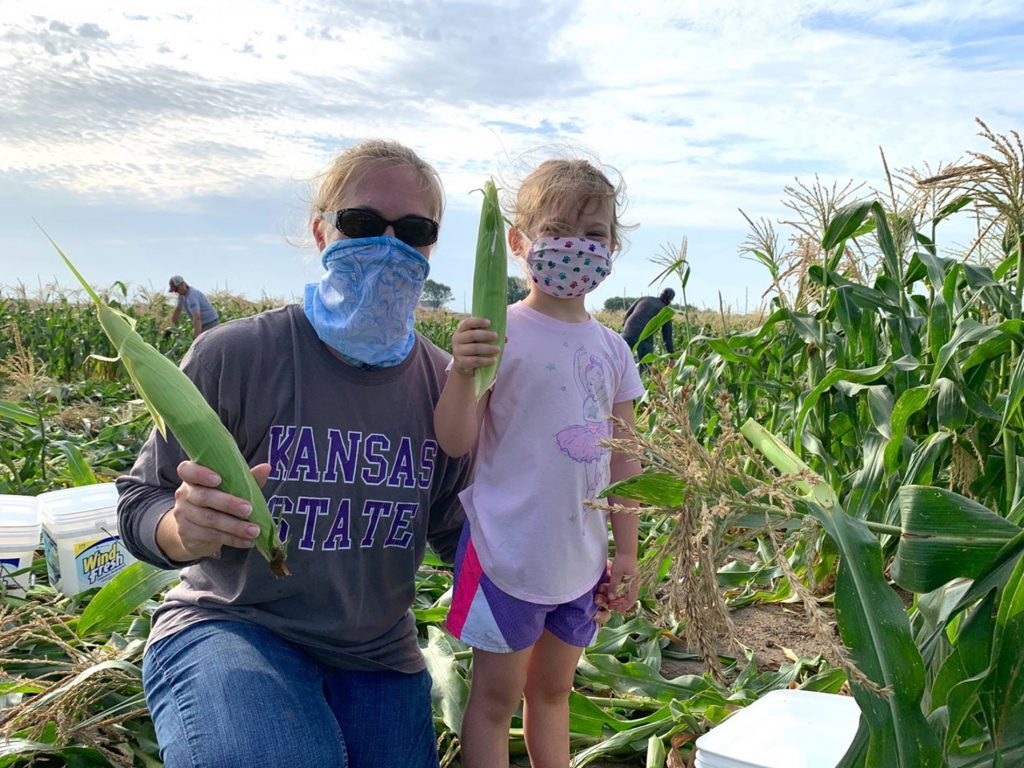Family Picking Corn